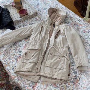 Long cream coat lined with fur